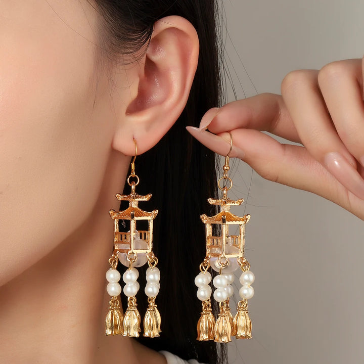 Traditional Gold Lantern Pearl Tassel Jhumka Earrings – Elegant Festive & Wedding Wear